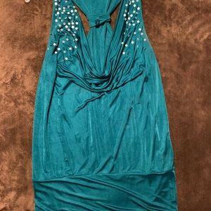 Medium green sleeveless blouse